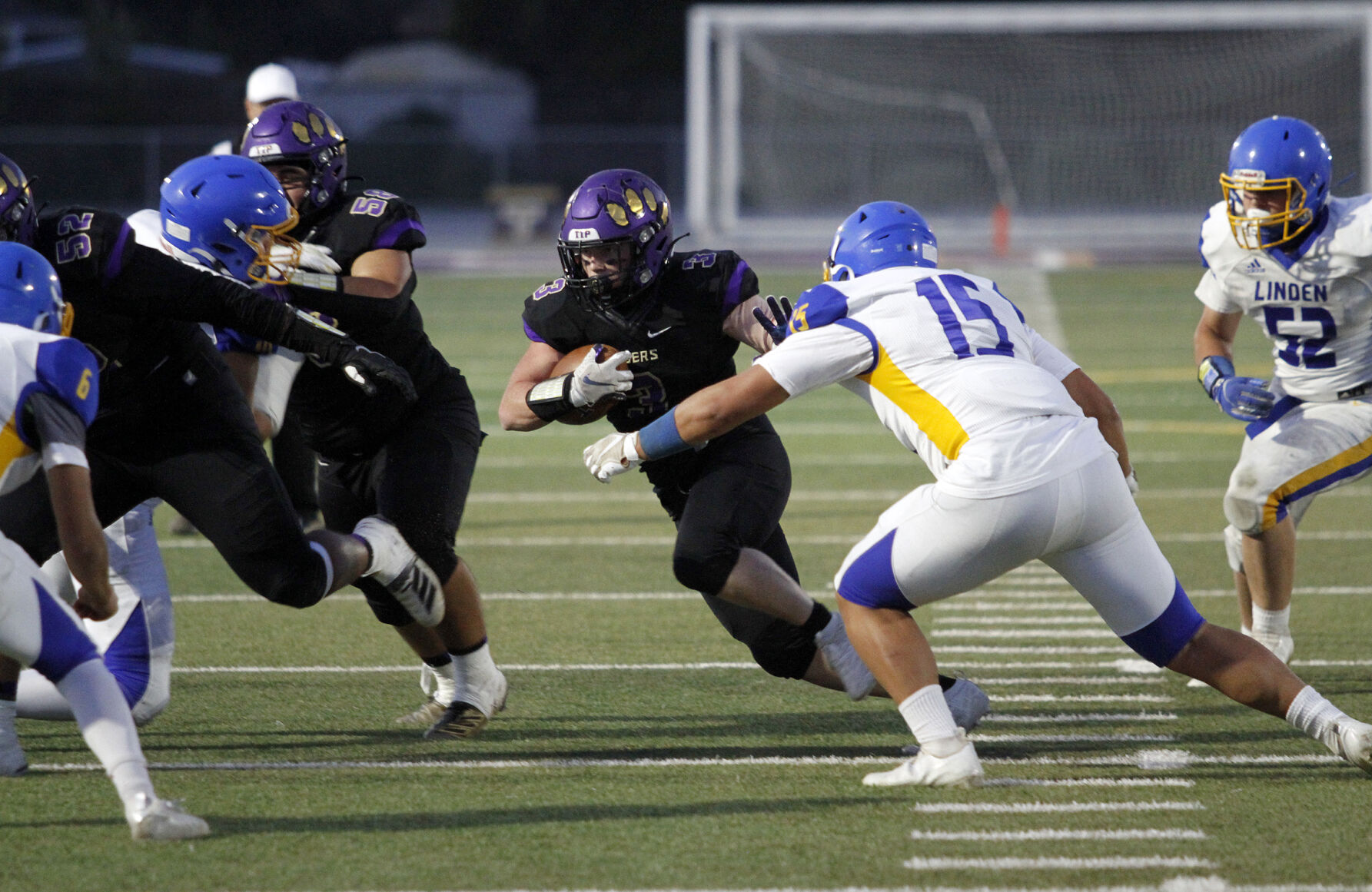High school football Tigers eke out victory over Linden